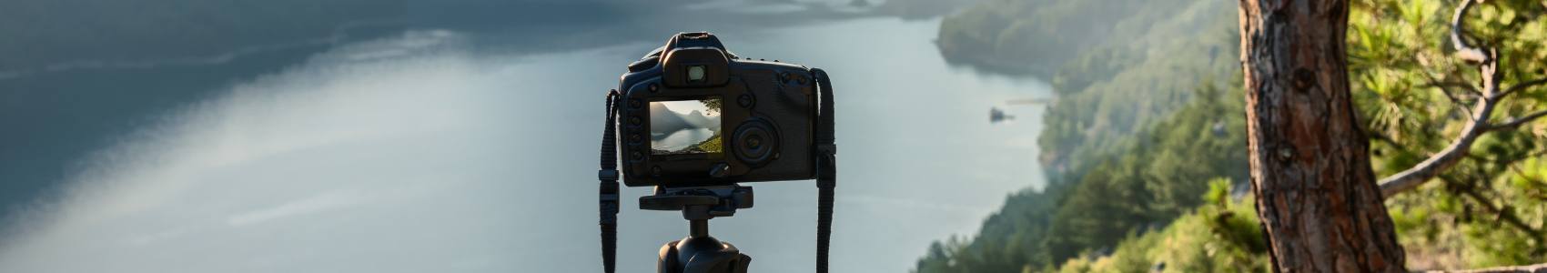 Storytelling photography: a camera overlooks lake during a photography shoot